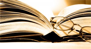 Book and reading glasses
