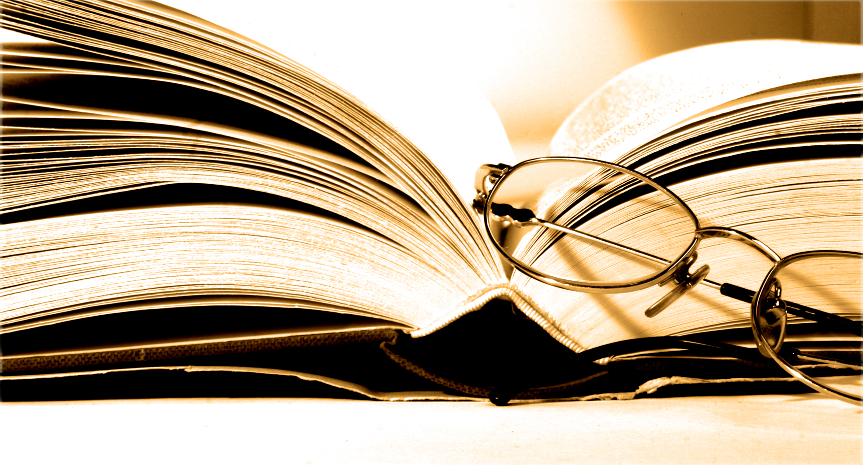 Book and reading glasses
